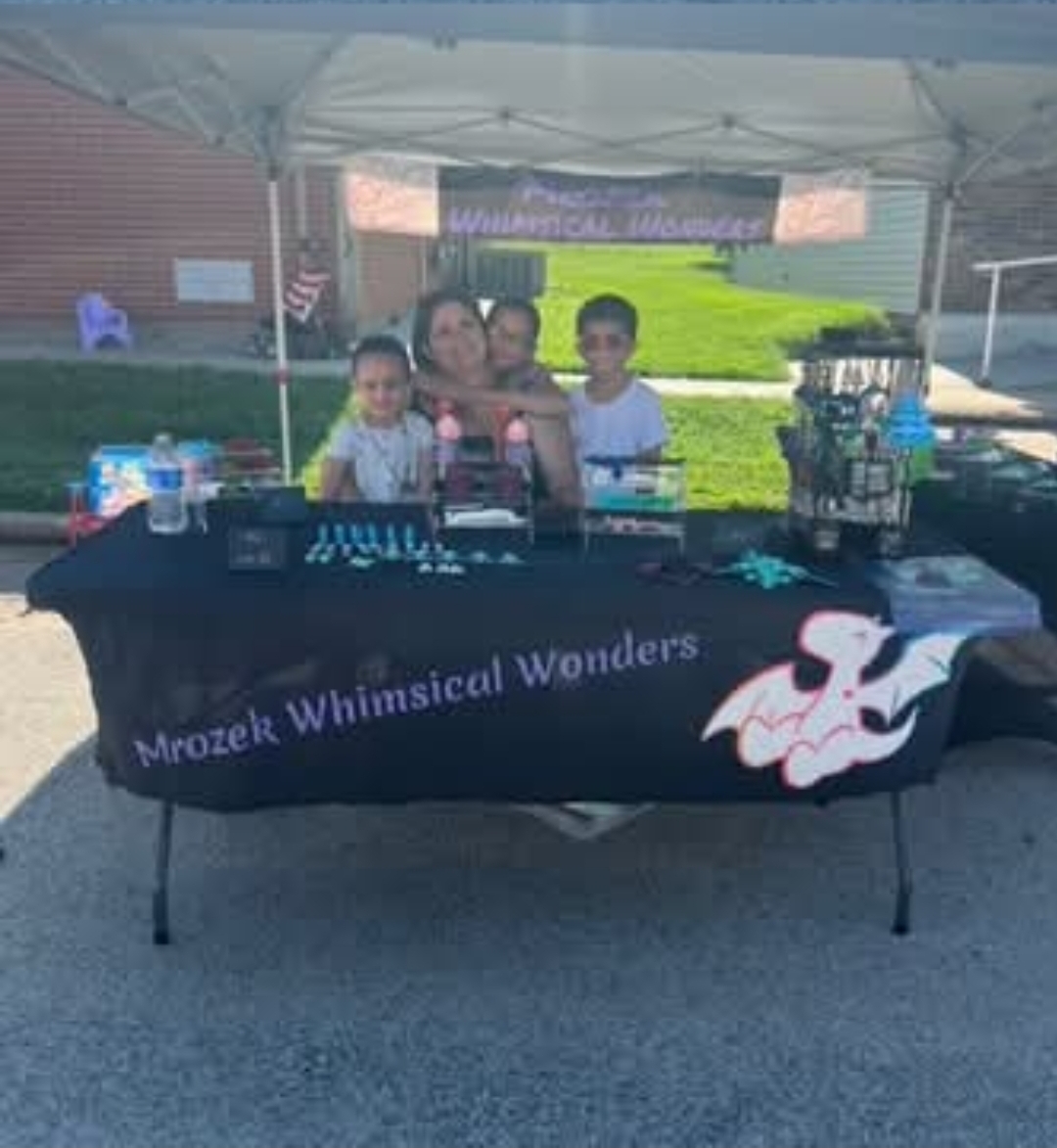 Mrozek Whimsical Wonders booth at an outdoor event